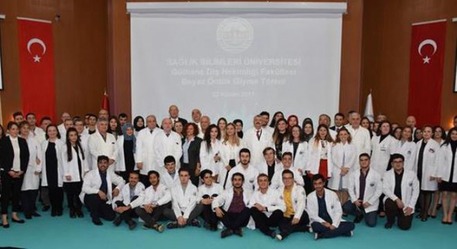 Adaylara beyaz önlük