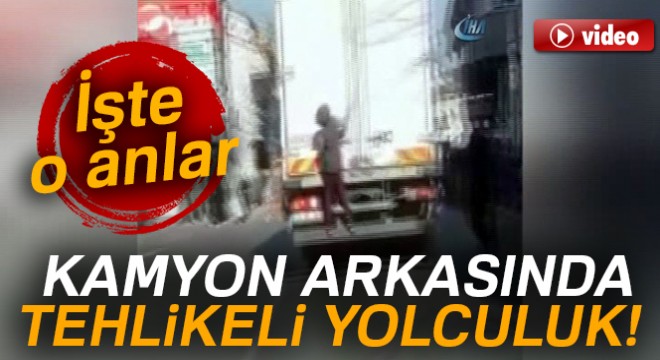 Kamyonun arkasından tutunan çocuğun tehlikeli oyunu kamerada